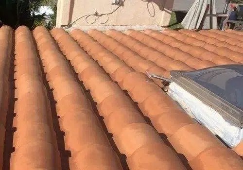 Clean terracotta barrel roof after pressure washing